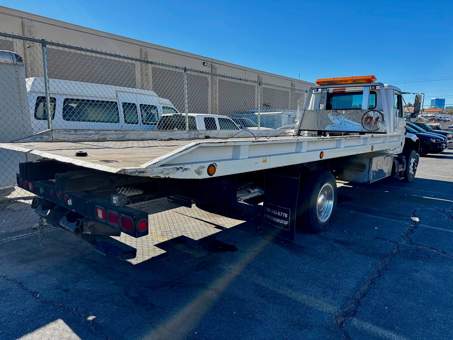 2001 International 4700 Flatbed Tow Truck